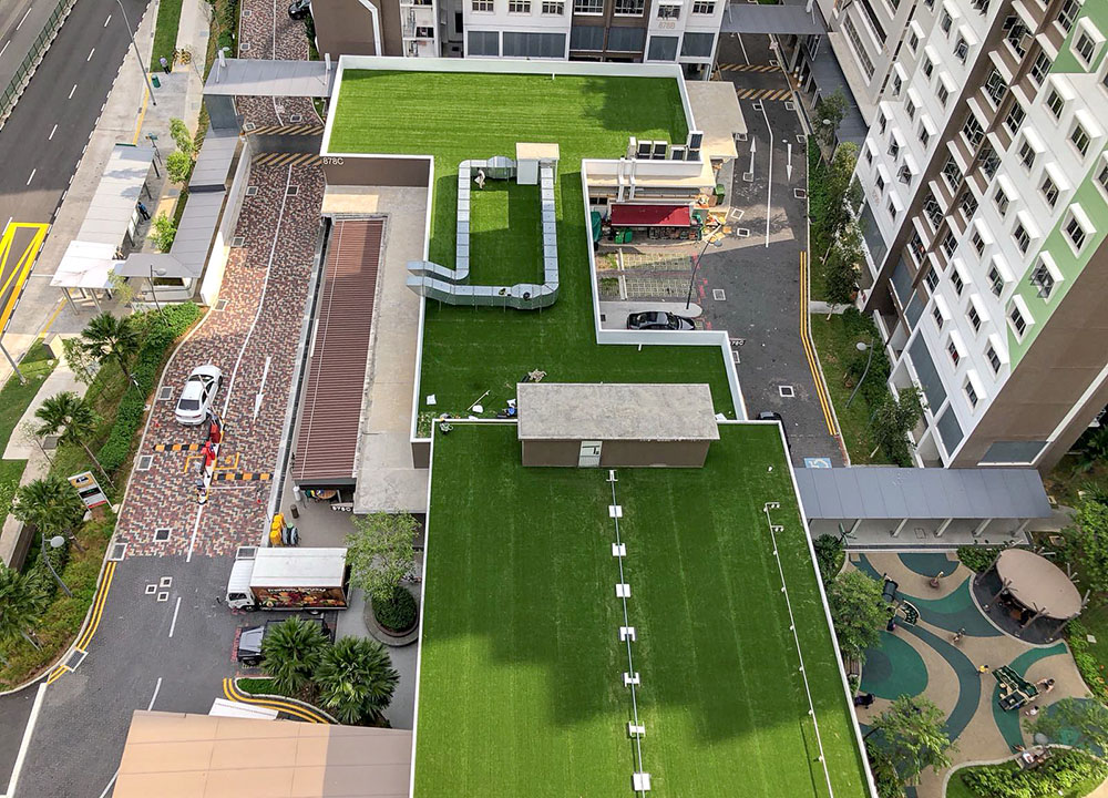 Outdoor artificial grass flooring for Tampines roof